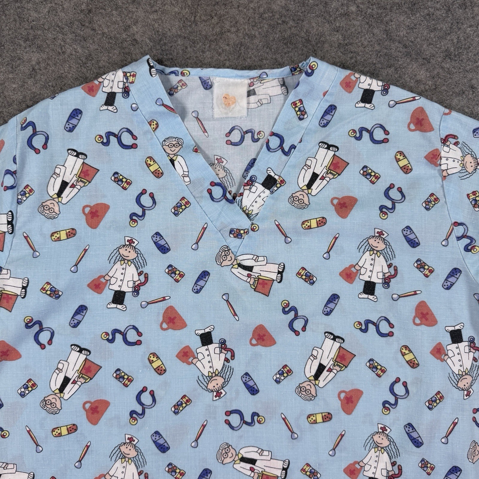 Ubranded Medical Nurse Graphic Scrubs Top Women’s (Size See Photos) Multicolors