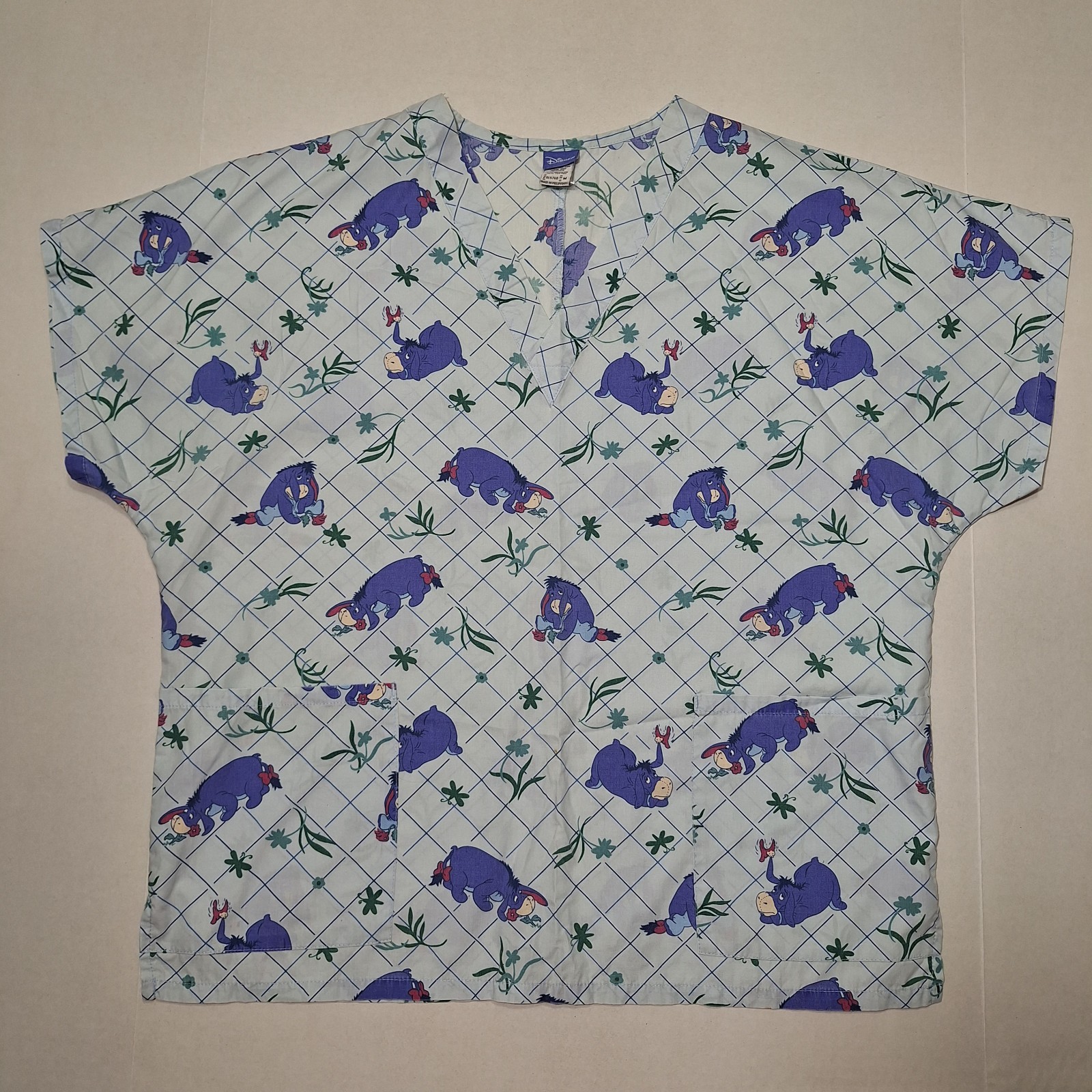 Disney Women’s Eeyore Blue Graphic Print Medical Nursing Scrub Top Size Medium