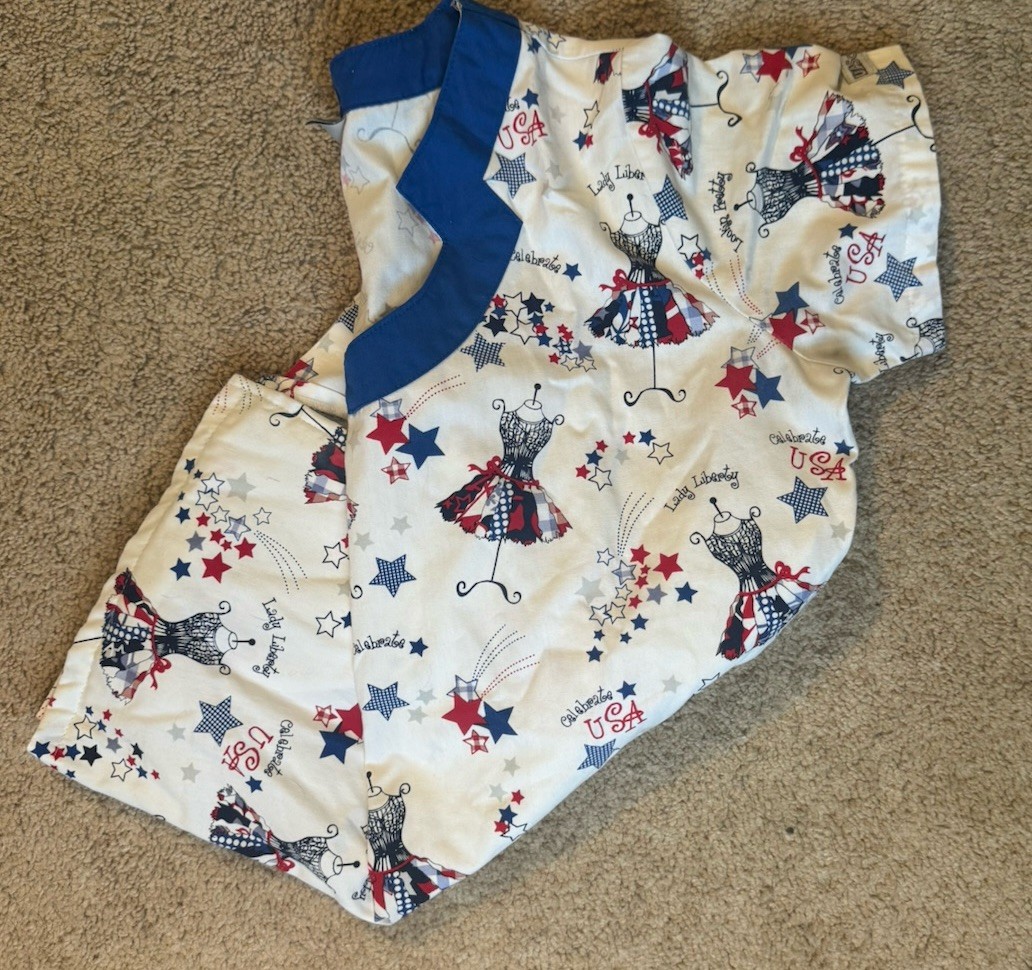 Women’s Size Small Lady Liberty Red,white, And Blue Scrub Top.
