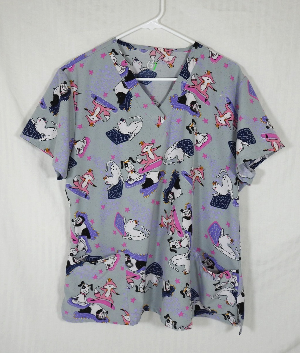 Women’s GT Performance Medical Scrub Top XL. Exercising/Yoga Animals.