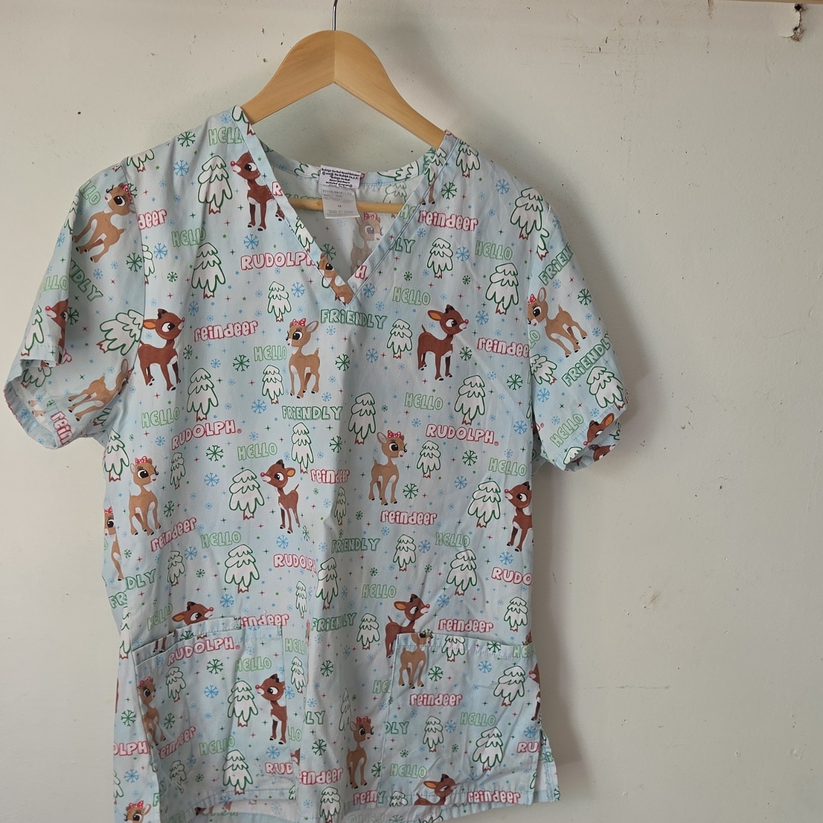 Rudolph the Red-Nosed Reindeer Patterned Scrub Top Turq Medical Size M