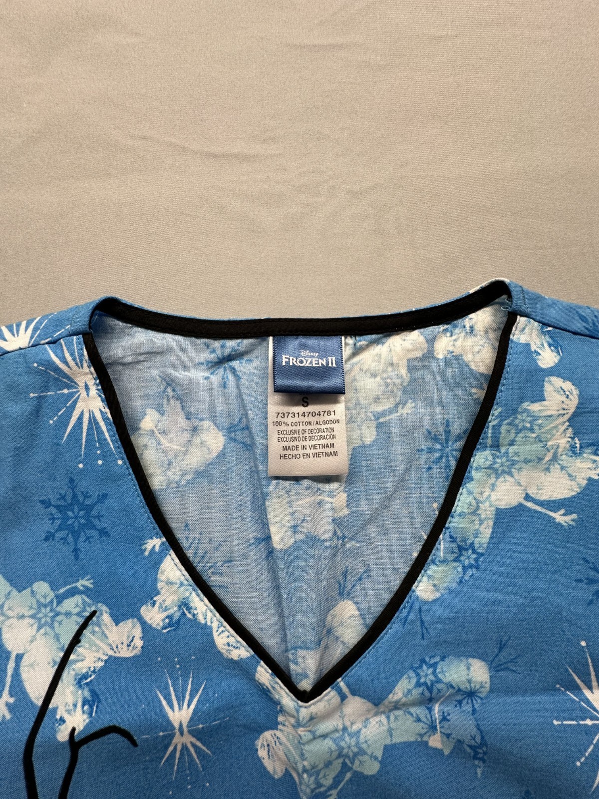 Olaf Tooniforms Licensed Frozen V Neck Scrub Top (TF626 FZIB), Size Small.