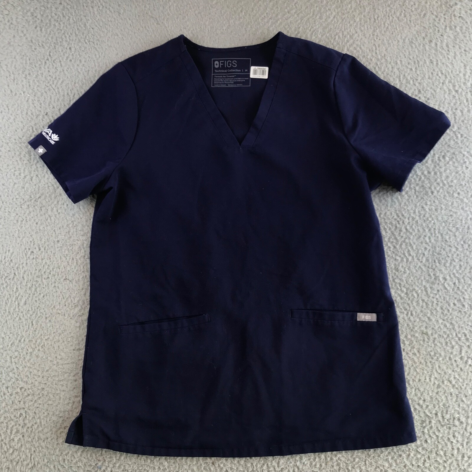 Figs Scrub Top Medium Blue Short Sleeve V-Neck Pockets Aya Healthcare Logo