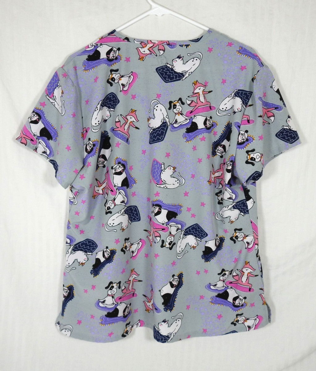 Women’s GT Performance Medical Scrub Top XL. Exercising/Yoga Animals.